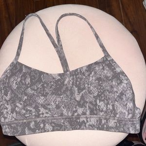 Lululemon Flow Y Sports bra. Purple/grey snakeskin pattern. Size: 6